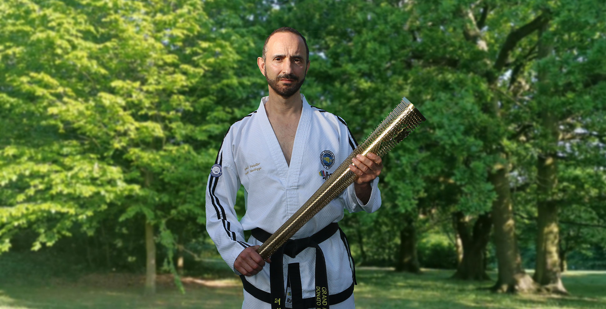 Chief Instructor Grand Master Nardizzi with Olympic Torch